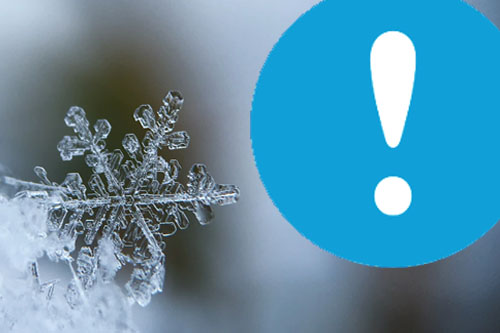Snow flake with white exclamation mark graphic